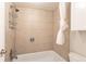 Shower and tub with tile surround at 5300 E Cherry Creek South Dr # 905, Denver, CO 80246