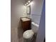 Neat bathroom with granite countertop and a toilet at 14697 E Oregon Dr, Aurora, CO 80012