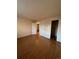 Spacious bedroom with wood flooring and access to closets at 14697 E Oregon Dr, Aurora, CO 80012