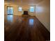 Living room with hardwood floors and fireplace at 14697 E Oregon Dr, Aurora, CO 80012