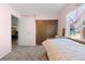 Pink Bedroom with a closet and a dresser at 16673 E Kent Dr, Aurora, CO 80013