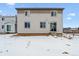 A two story home featuring a sliding glass door and fenced in backyard at 5918 Red Barn Ave, Mead, CO 80504