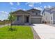 Charming two-story home featuring a well-manicured lawn and a two-car garage, perfect for a modern Gathering at 5918 Red Barn Ave, Mead, CO 80504