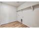 Functional laundry room with ample space, featuring convenient shelving and essential appliance connections at 5918 Red Barn Ave, Mead, CO 80504