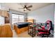 Cozy bedroom with built-in desk and gaming chair at 168 Peabody St, Castle Rock, CO 80104