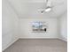 Bright bedroom with neutral carpet, white walls, and ceiling fan at 10818 Cimarron St # 307, Firestone, CO 80504