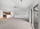 Spacious living room with vaulted ceilings, plenty of natural light, and an open-concept layout at 10818 Cimarron St # 307, Firestone, CO 80504