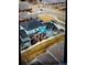 Aerial view of a residential townhome complex featuring well-maintained landscaping and multiple units at 883 Widgeon Cir, Longmont, CO 80503