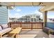 Relaxing balcony with comfortable seating and string lights, perfect for enjoying the beautiful views at 883 Widgeon Cir, Longmont, CO 80503