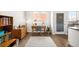 Bright office space featuring a desk, bookcase, and a large window offering natural light at 883 Widgeon Cir, Longmont, CO 80503