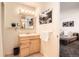 Bright bathroom featuring a wood vanity and wall art at 3850 Paseo Del Prado # 29, Boulder, CO 80301