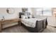 Bedroom featuring a desk, wall decor and a comfortable bed at 3850 Paseo Del Prado # 29, Boulder, CO 80301