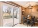 Cozy dining area with sliding door access to an outdoor deck, perfect for entertaining and enjoying the view at 3850 Paseo Del Prado # 29, Boulder, CO 80301