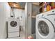 Laundry room with a washer and dryer at 1235 S Monaco Pkwy, Denver, CO 80224