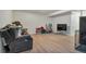 Spacious living room area with lots of storage area and nice wood flooring at 1235 S Monaco Pkwy, Denver, CO 80224