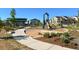 Community playground featuring modern equipment, picnic tables, and lush landscaping at 9501 Richfield St, Commerce City, CO 80022