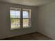 Bedroom with natural light from a window offering a neighborhood view at 737 Raindance St, Erie, CO 80516