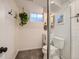 A simple bathroom features a sleek vanity and toilet at 6642 S Pearl St, Centennial, CO 80121