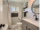 Charming bathroom featuring updated vanity, modern fixtures, and stylish accents at 6642 S Pearl St, Centennial, CO 80121