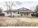 Backyard showcasing the home's exterior and well-maintained outdoor space at 3624 S Poplar St, Denver, CO 80237