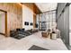 Luxury building lobby featuring marble floors, wood accents, and a stylish reception area at 155 Steele St # 917, Denver, CO 80206