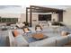 Stylish rooftop terrace offering ample seating, an outdoor kitchen, and city views at 155 Steele St # 917, Denver, CO 80206