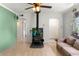 Inviting living area featuring a vintage fireplace, hardwood floors, and comfortable seating at 8991 Hickory Pl, Thornton, CO 80229