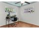 Bright office with two windows, ceiling fan and desk for a productive workspace at 8991 Hickory Pl, Thornton, CO 80229