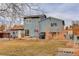 Home's backyard with patio, grass, and shed at 614 Glenwood Dr, Lafayette, CO 80026