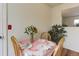 Small dining area with floral tablecloth and plants at 614 Glenwood Dr, Lafayette, CO 80026