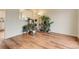 Living room featuring hardwood floors and abundant plants at 614 Glenwood Dr, Lafayette, CO 80026