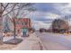 Residential street view, brick building, sidewalk, trees, and quiet atmosphere at 614 Glenwood Dr, Lafayette, CO 80026