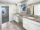 Double vanity bathroom with granite countertop at 26226 E Canal Pl, Aurora, CO 80018