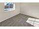 Bright bedroom with carpet and large window at 26226 E Canal Pl, Aurora, CO 80018