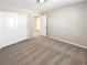 Bright bedroom with neutral walls and carpeting at 26226 E Canal Pl, Aurora, CO 80018