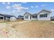 Landscaped backyard featuring a view of the house and surrounding neighborhood at 24740 E 39Th Ave, Aurora, CO 80019