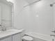 Clean bathroom with a shower-tub combination and a white single sink vanity at 24740 E 39Th Ave, Aurora, CO 80019