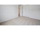 Bright bedroom with plush carpet, a closet, and neutral walls at 24740 E 39Th Ave, Aurora, CO 80019