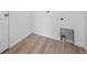 A clean, utilitarian laundry area with modern flooring at 24740 E 39Th Ave, Aurora, CO 80019