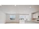 Bright living space featuring lots of natural light, hardwood flooring, and an open floor plan at 24740 E 39Th Ave, Aurora, CO 80019