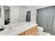 Bright bathroom with dual sinks and shower-tub combo at 5149 S Genoa Ct, Centennial, CO 80015