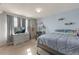 Comfortable bedroom with light-blue painted walls and carpeted floors at 5149 S Genoa Ct, Centennial, CO 80015