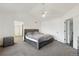 Bright main bedroom with vaulted ceiling and ensuite bathroom access at 5149 S Genoa Ct, Centennial, CO 80015