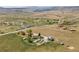 Sweeping aerial view of the rural property with picturesque mountain views and serene surroundings at 6310 W County Road 4, Berthoud, CO 80513