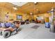 Interior space showcasing its functionality with tools, large lawn mower and ample space at 6310 W County Road 4, Berthoud, CO 80513