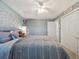 Cozy bedroom with decorative dream catcher and closet providing ample storage space at 7379 S Lafayette W Cir, Centennial, CO 80122