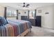 Bright bedroom with multiple windows providing natural light and lots of storage space at 7379 S Lafayette W Cir, Centennial, CO 80122