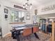 Cozy dining area with ample natural light, modern decor, and seating for four at 7379 S Lafayette W Cir, Centennial, CO 80122
