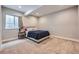 Cozy bedroom with neutral tones, soft carpet, and a comfortable bed at 3630 Gold Bug St, Aurora, CO 80019