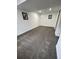 Finished basement area with neutral carpeting, white trim, and recessed lighting at 3575 S Ouray St, Aurora, CO 80013